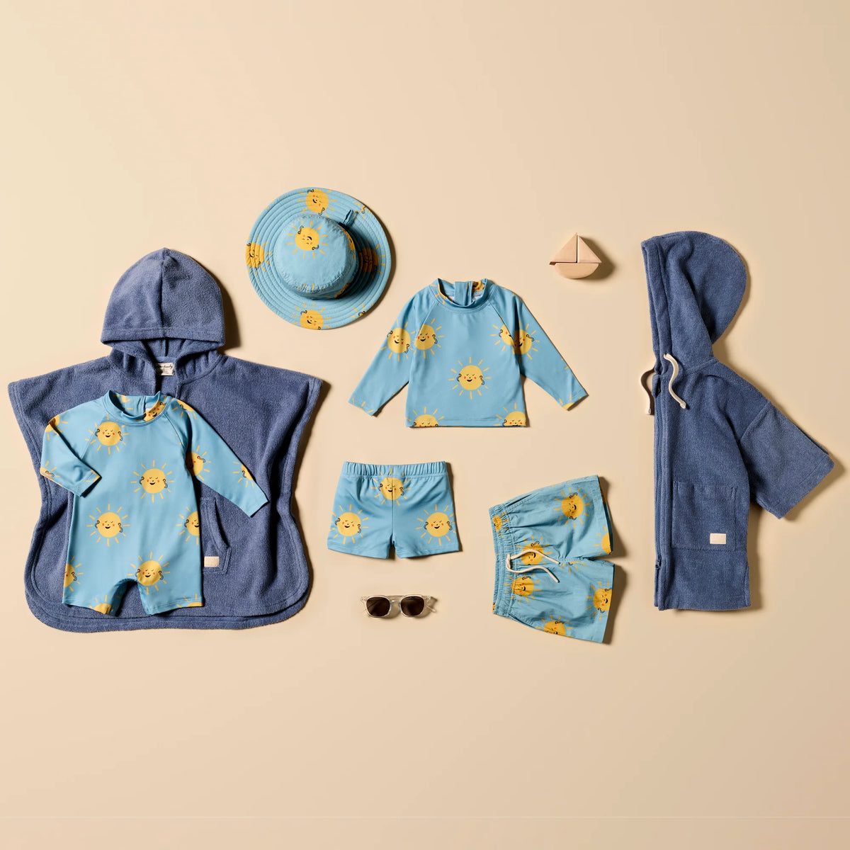 Wilson and Frenchy Deep Blue Organic Terry Hooded Poncho - baby wearing poncho