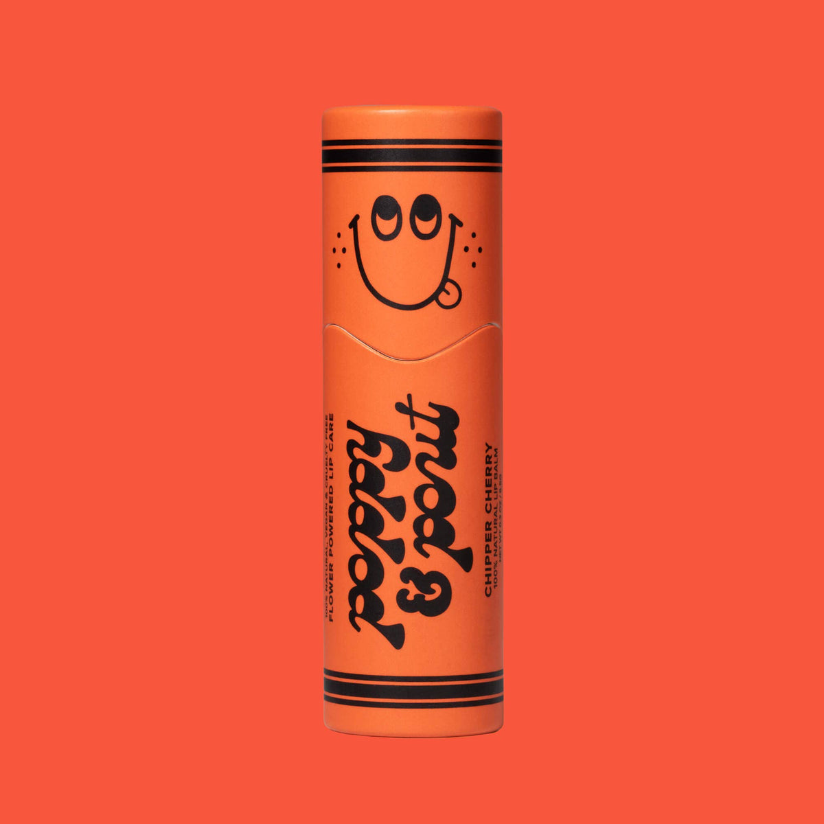 Poppy and Pout Chipper Cherry kids lip balm - styled flat lay