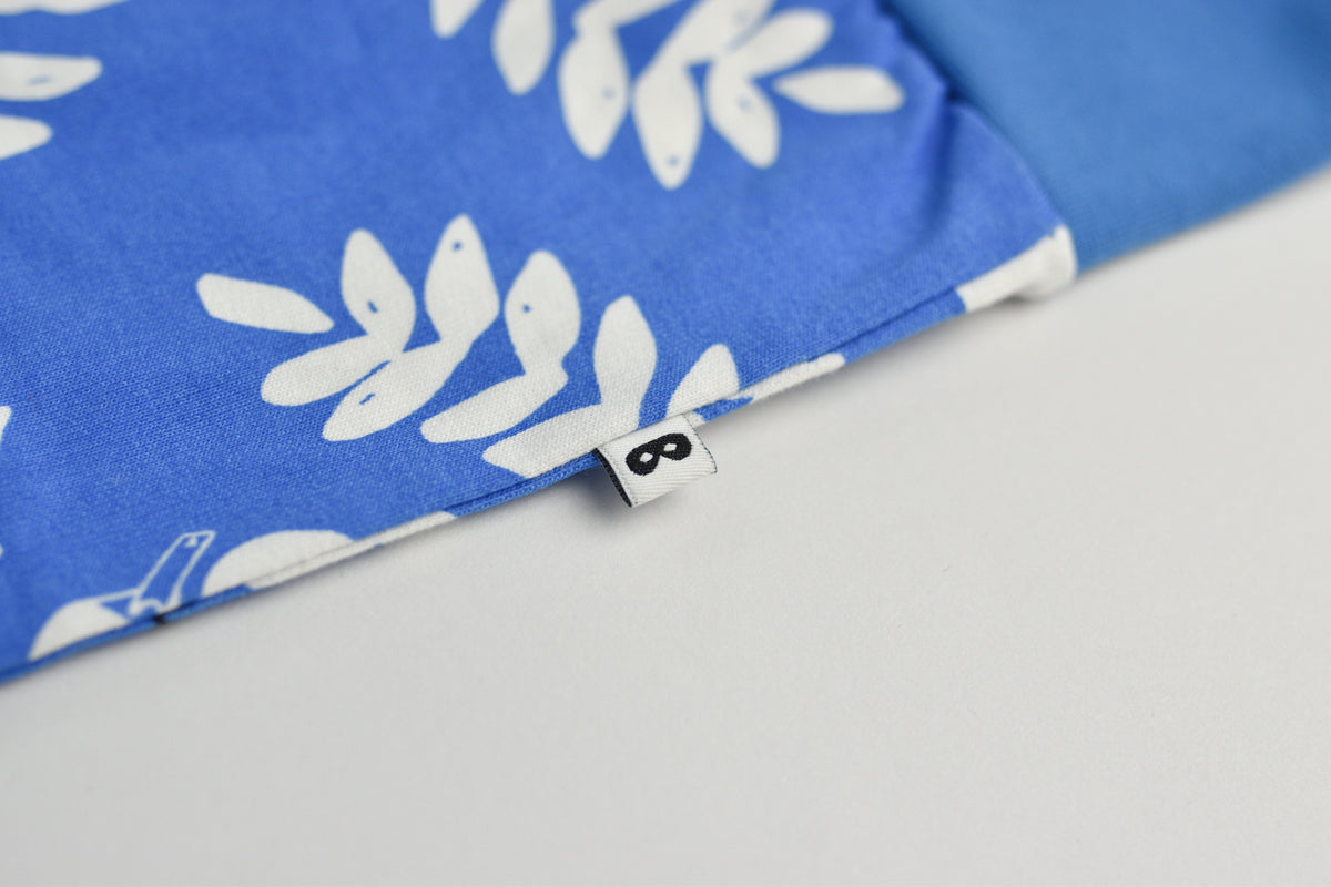RE LOVED Beau Loves track pants size 4-5 — close-up detail