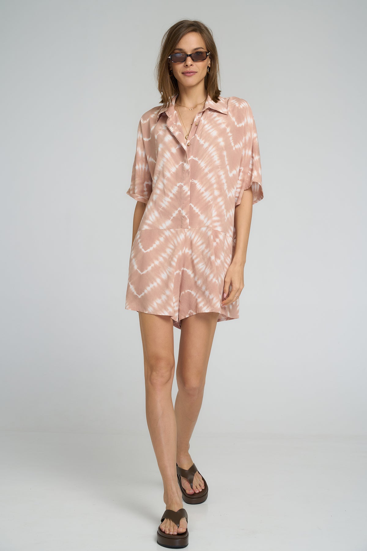 Lilya Del Rio Playsuit Celestial Tie Dye Guava - lifestyle styled