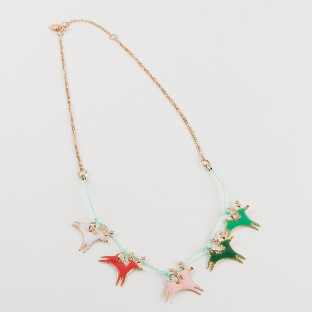 Meri Meri - Reindeer Enamel Necklace — styled lifestyle shot
