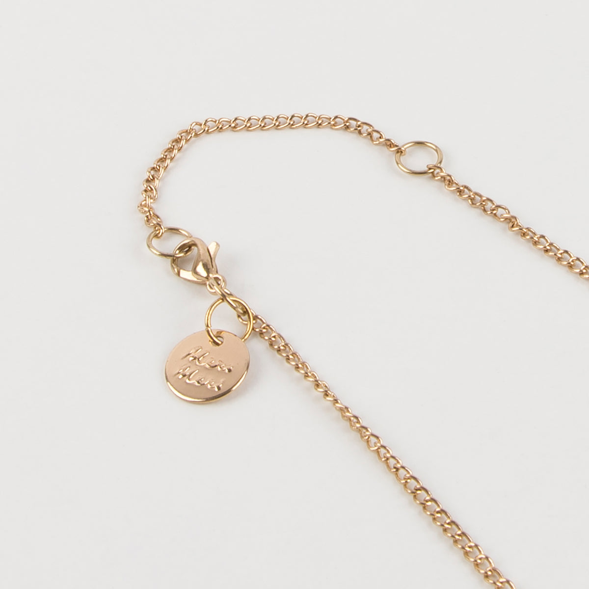 Meri Meri - Reindeer Enamel Necklace — close-up detail