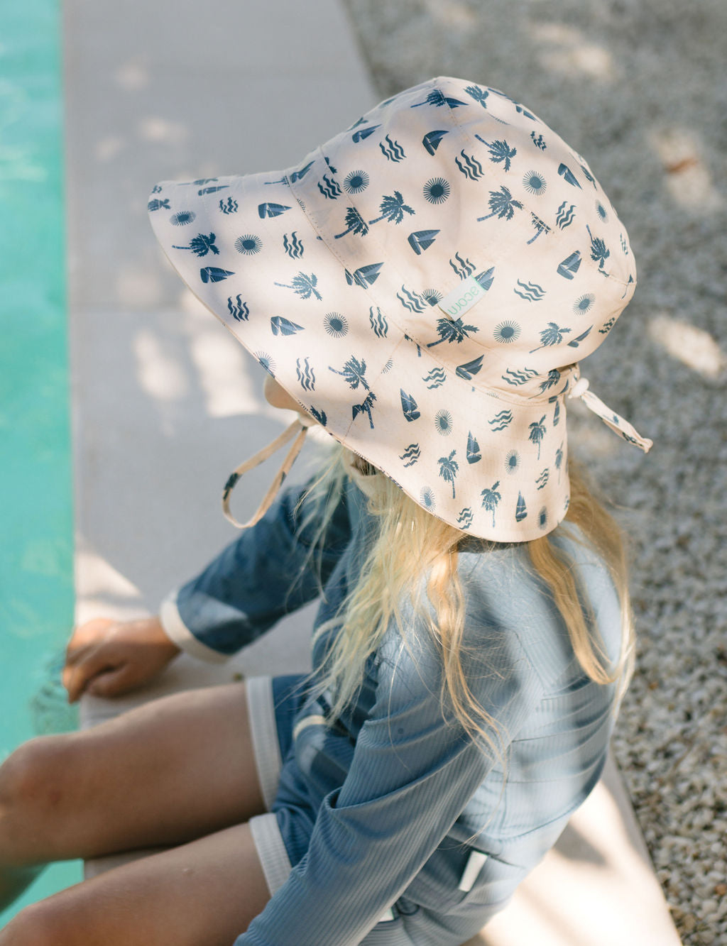 Acorn Island Breeze Wide Brim Bucket Hat - front view on model