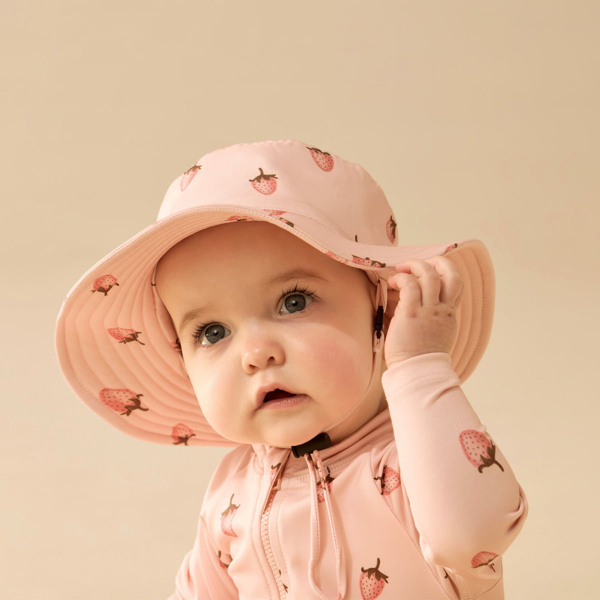 Wilson and Frenchy Strawberry Kisses Swim Sun Hat - baby wearing hat
