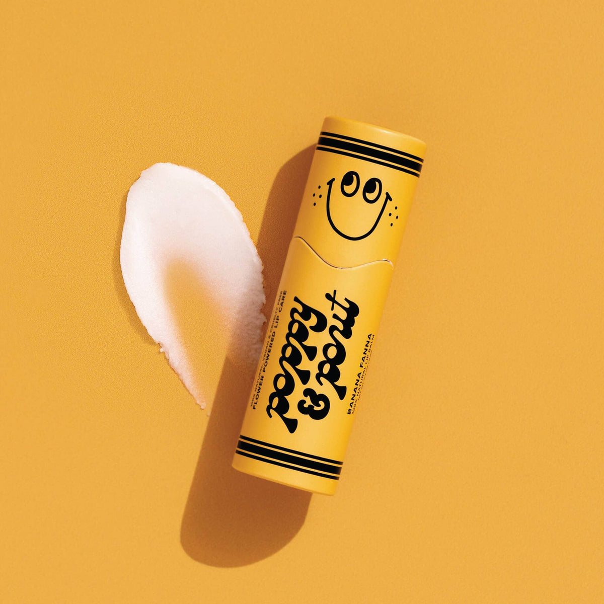 Poppy and Pout Lil Poppies Banana Fanna Lip Balm - product flatlay