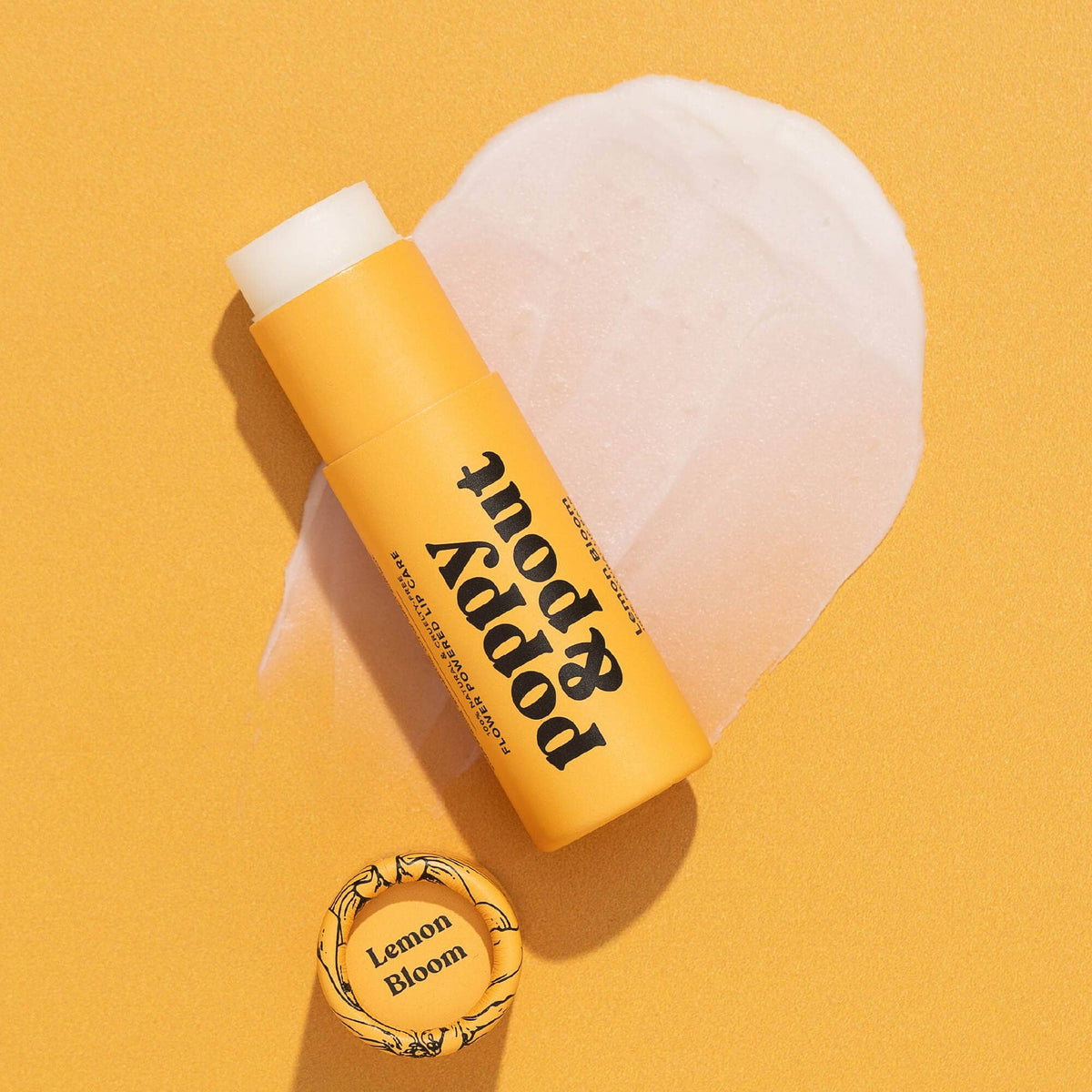 Poppy and Pout Lemon Bloom Lip Balm - product flatlay