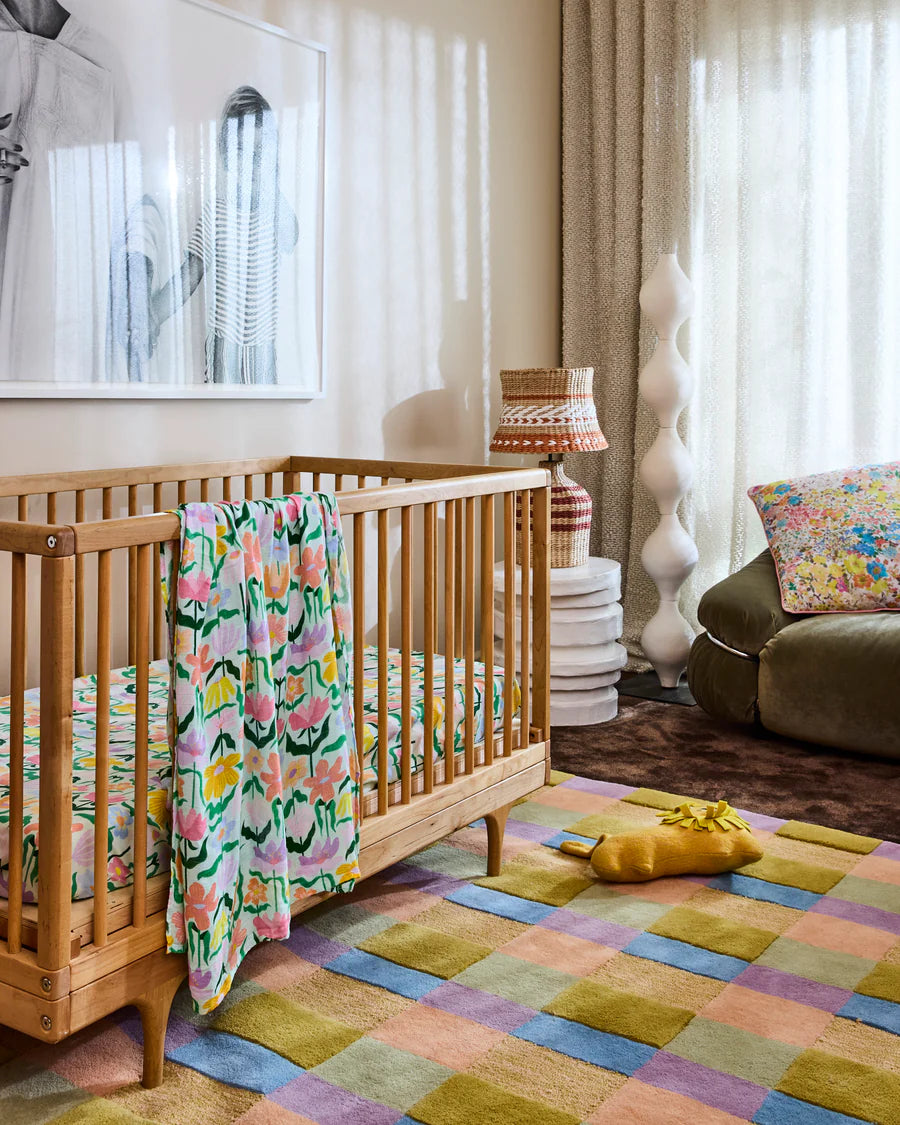Kip and Co Popping Flowers bamboo swaddle - baby wrapped