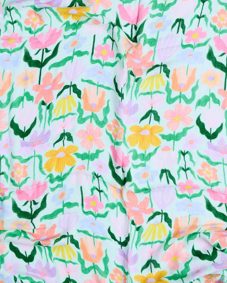 Kip and Co Popping Flowers green bamboo swaddle - styled nursery