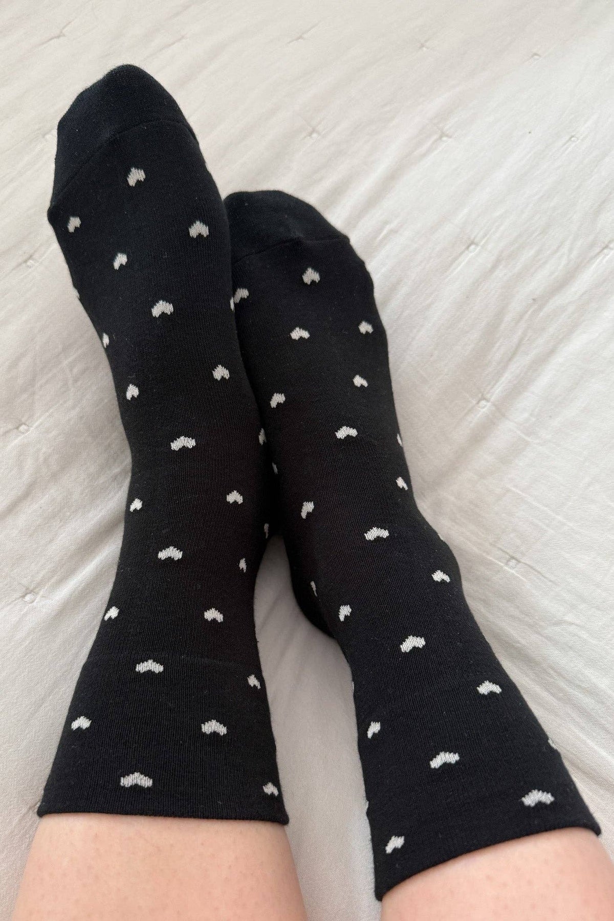 Close-up of Le Bon Shoppe Heart Sneaker Socks in Black/Cream cotton blend