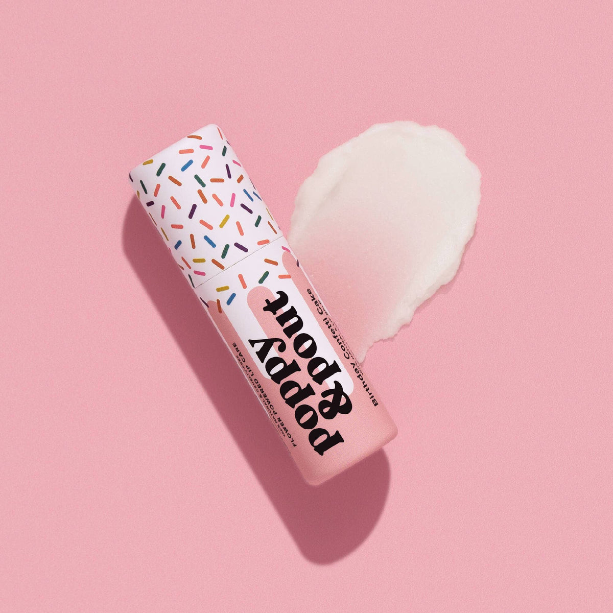 Poppy and Pout Pink Birthday Confetti Cake Lip Balm - product flatlay