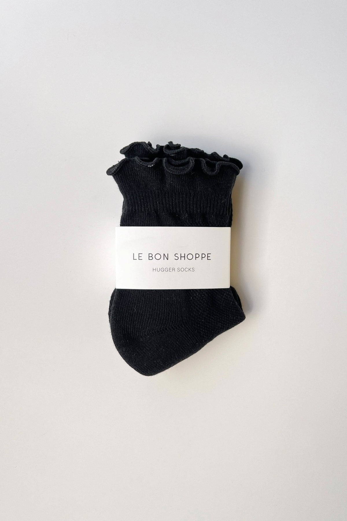 Le Bon Shoppe Black Ruffled Hugger Crew Socks - lifestyle styled