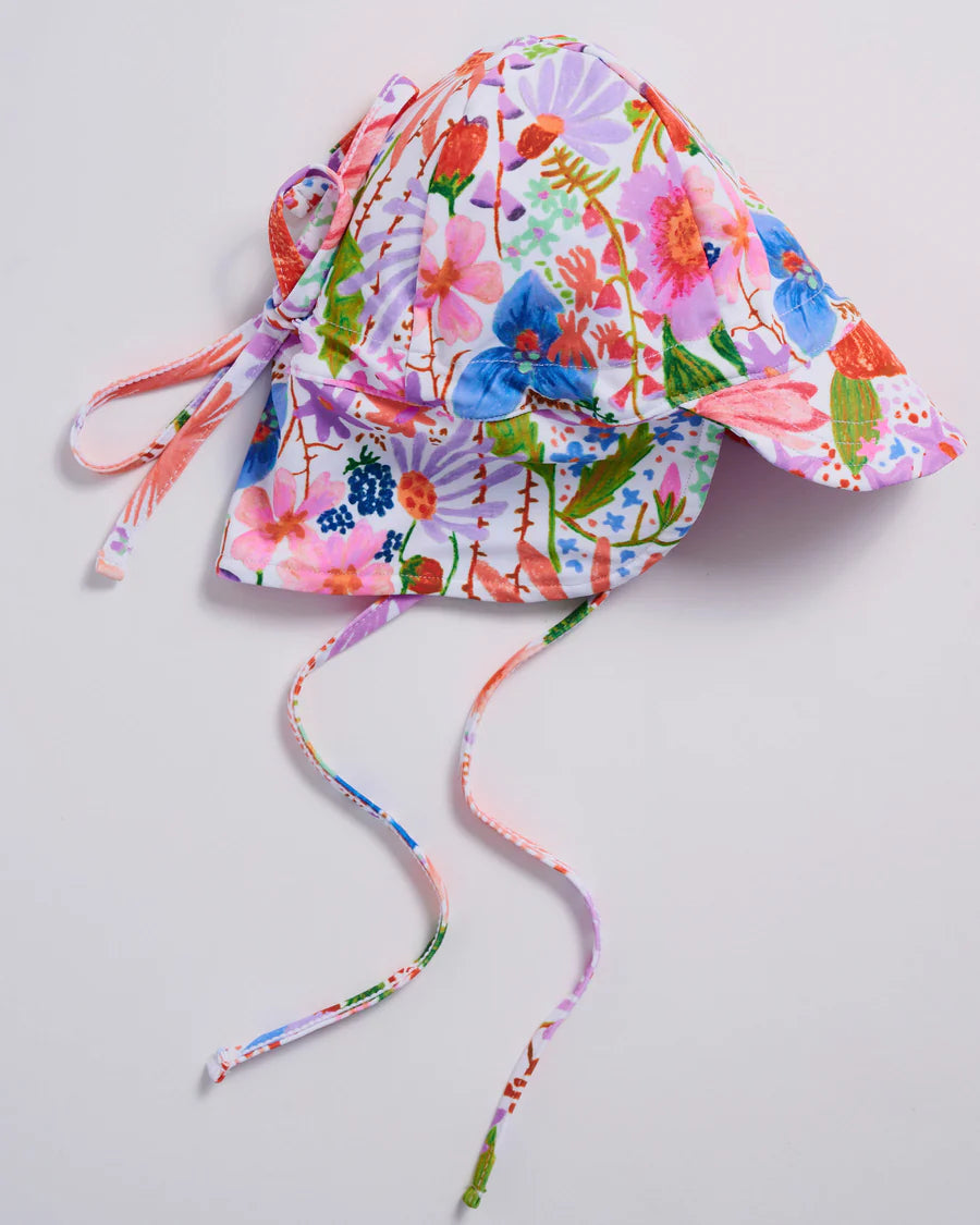Kip and Co Meandering Meadow baby hat - side view on baby
