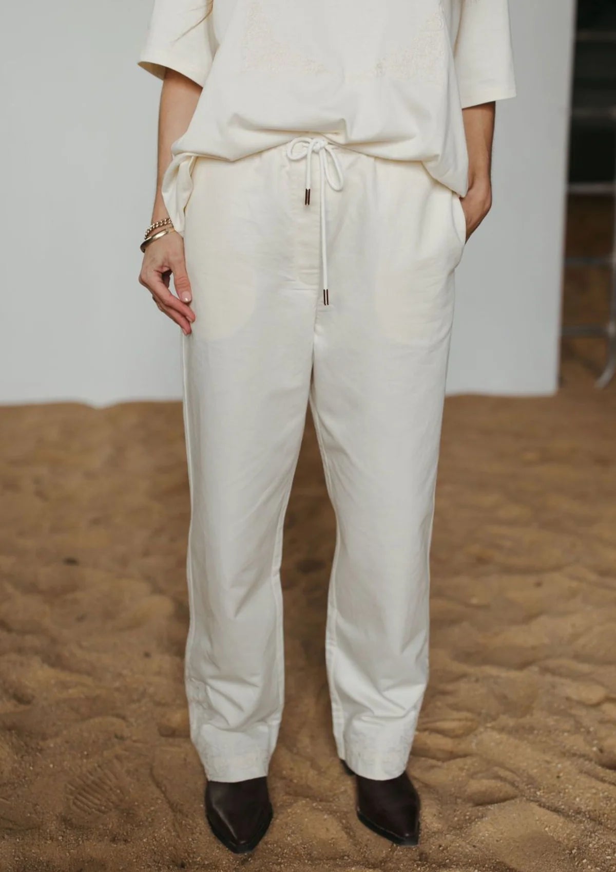 FAR MER - Paisley Emboss Drawstring Pants — back view flat lay