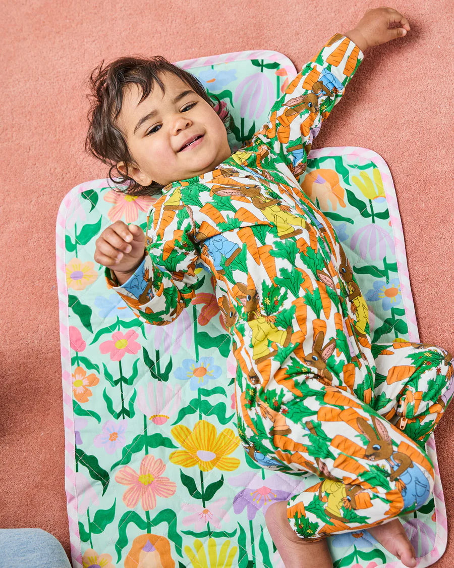 Kip and Co Popping Flowers change mat - baby on mat lifestyle