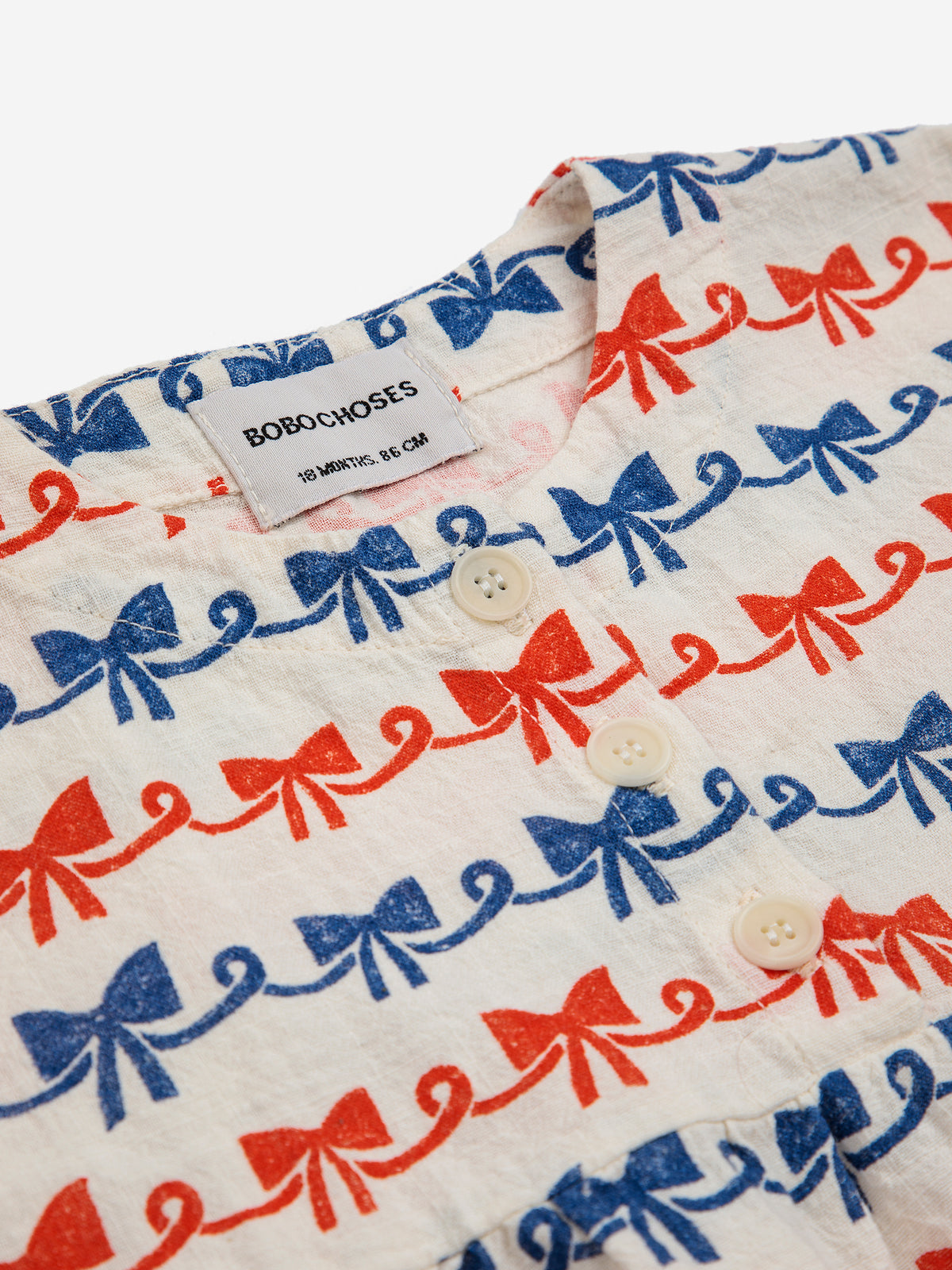 Bobo Choses BABY - Baby Ribbon Bow all over woven dress — product detail shot