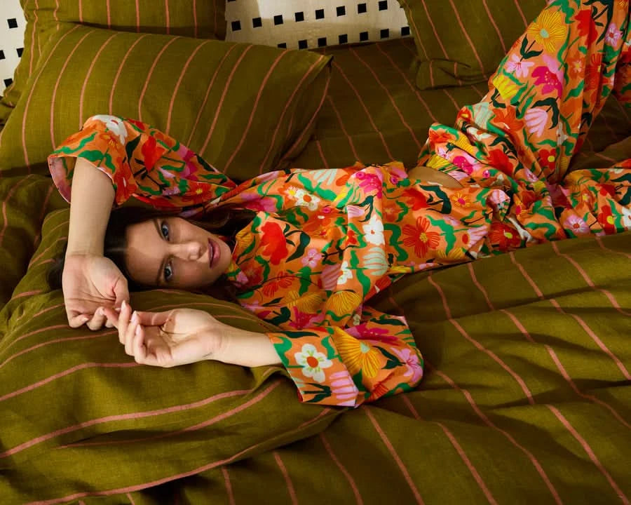 Kip and Co Popping Flowers Peach long sleeve pyjamas - lifestyle shot