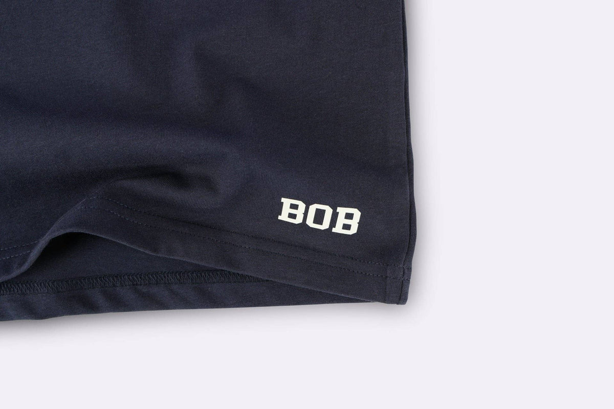 BBOBBIE - 07 Tee in Navy — back view flat lay