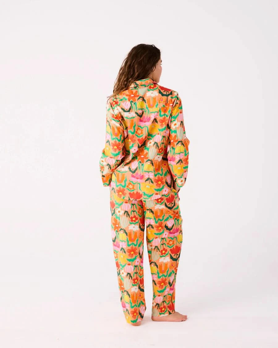 Kip and Co Popping Flowers Peach pyjamas - relaxed model lifestyle