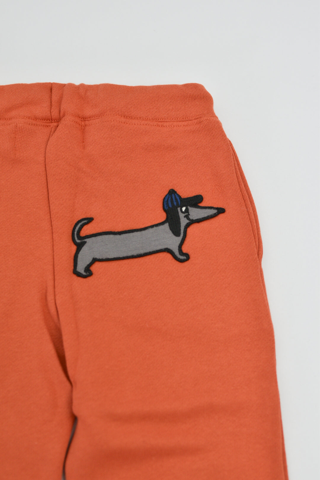 RE LOVED Nadadelazos track pant size 6 — styled lifestyle shot