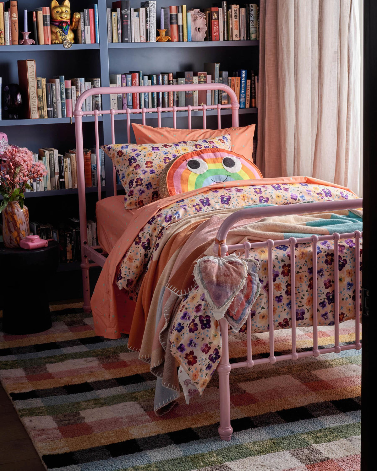 Kip and Co Rainbow cushion - bedroom lifestyle setting