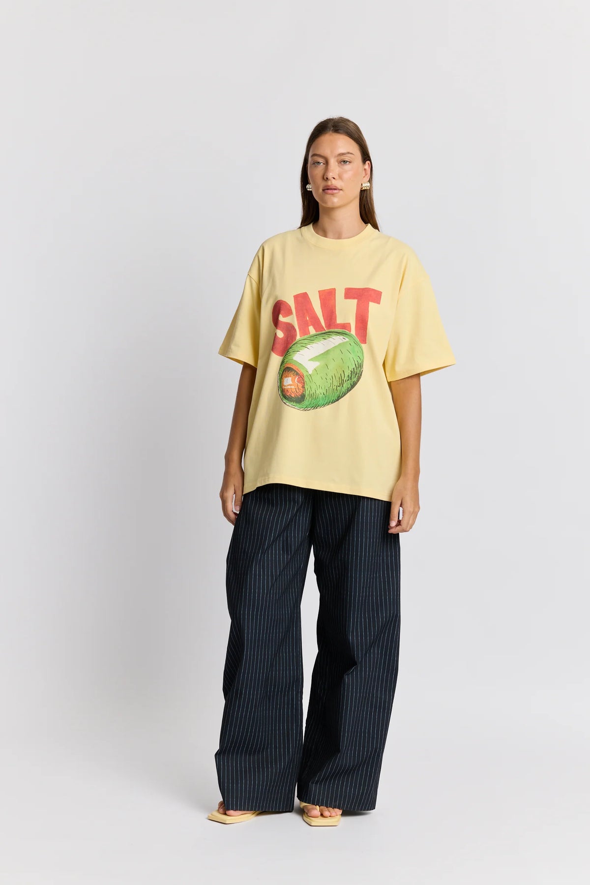 Maku Salt butter yellow tee - model wearing lifestyle