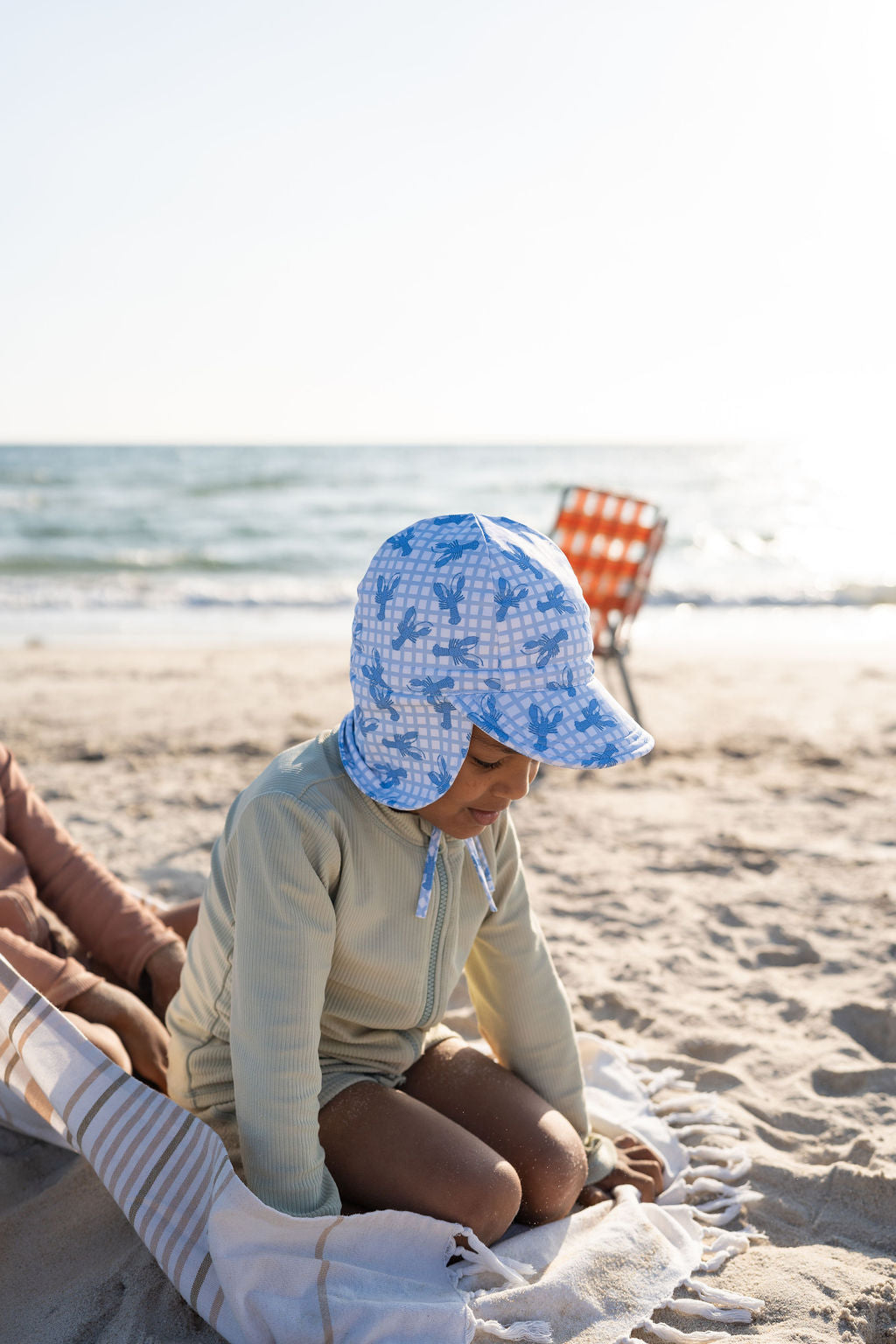 Acorn Blue Lobsters Swim Flap Cap - front view on child