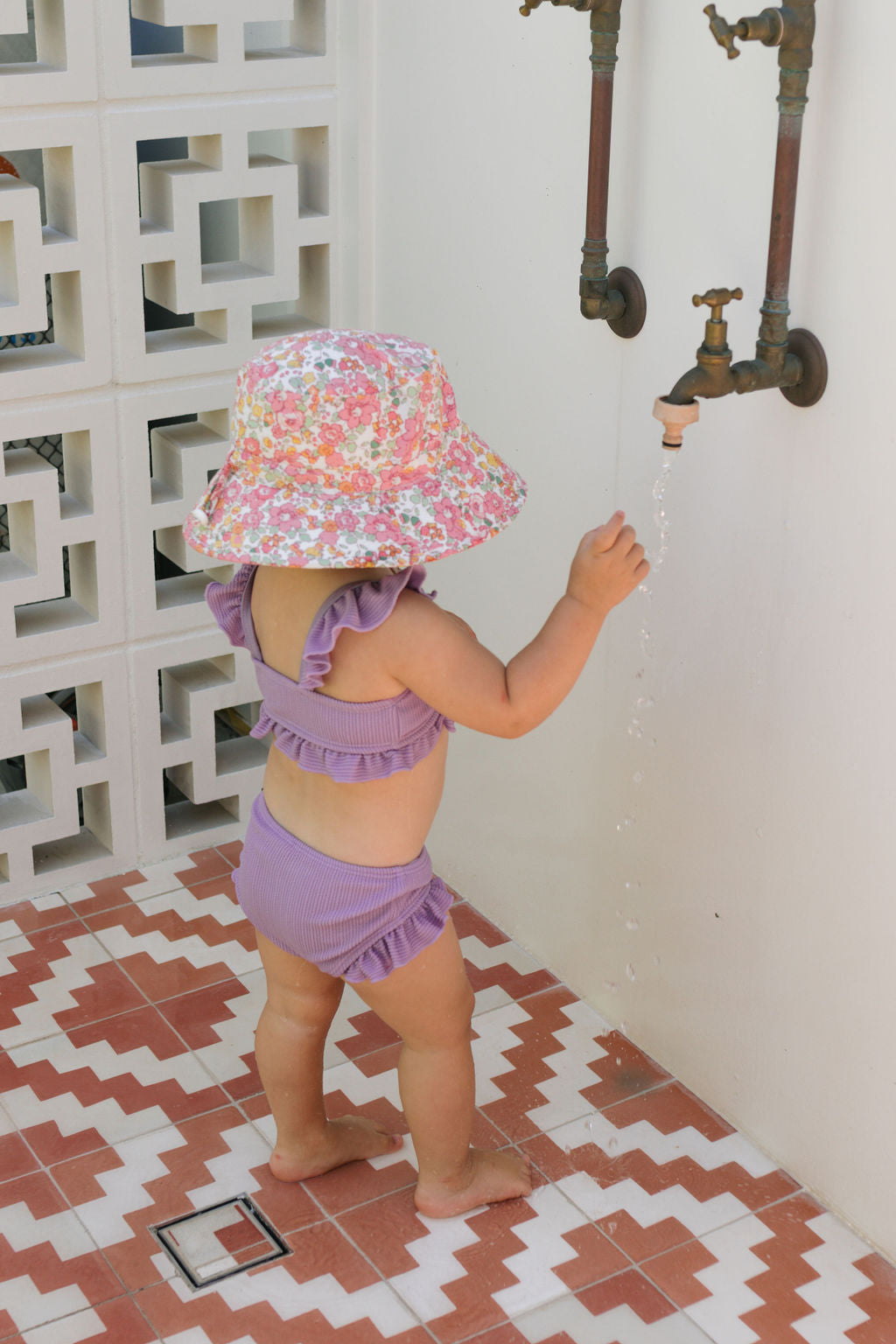 Acorn Tessa Broad Brim Bucket Hat - side view on model