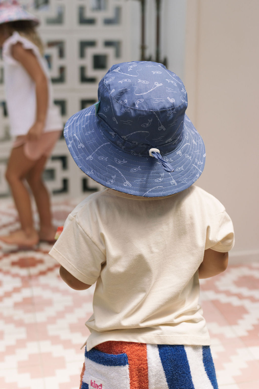 Acorn Gone Fishing Wide Brim Bucket Hat - side view on model