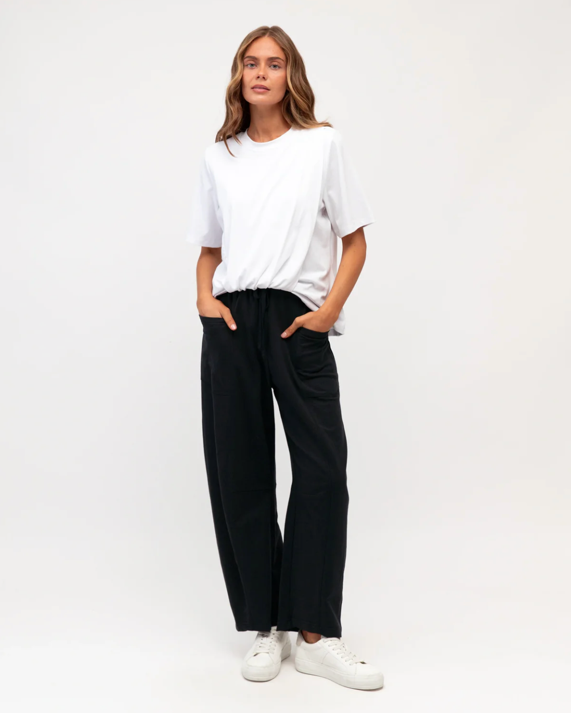 Label of Love - Barrel Leg Trackpant in Navy — front view flat lay