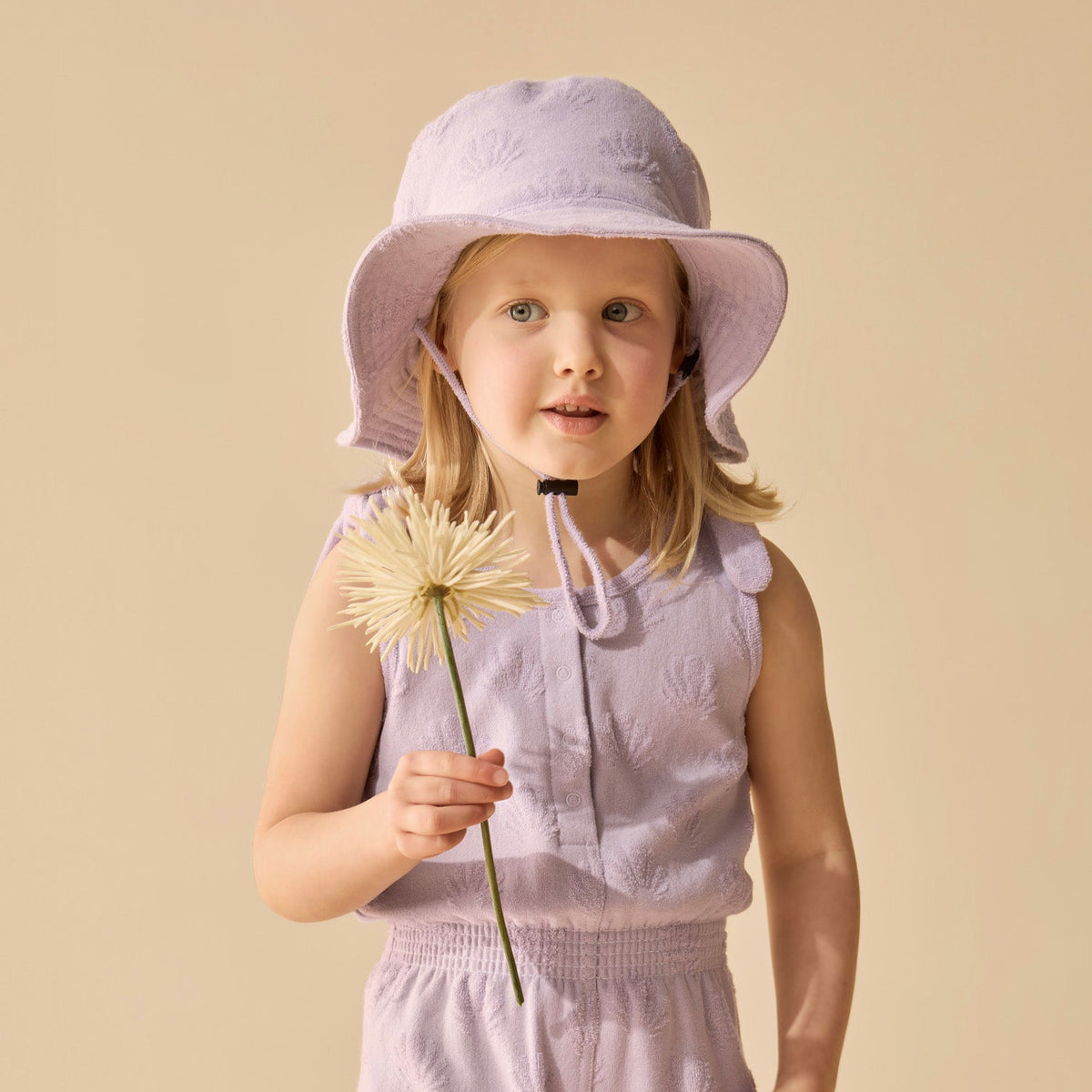 Wilson and Frenchy Lavender Shells Organic Terry Sun Hat - baby wearing hat