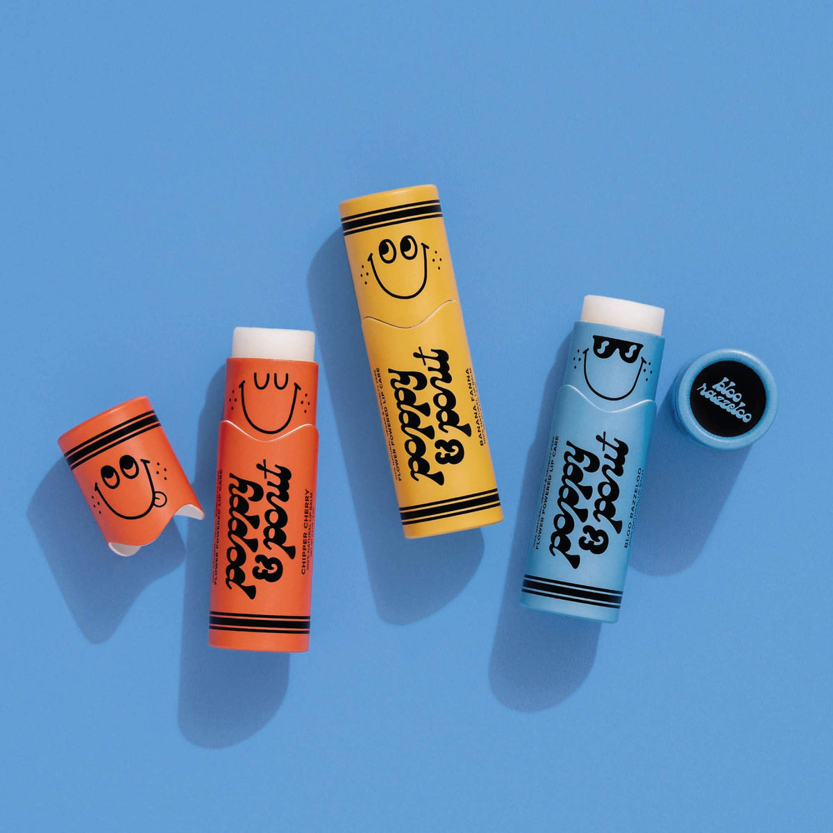 Poppy and Pout Bloo Razzeloo lip balm - child applying