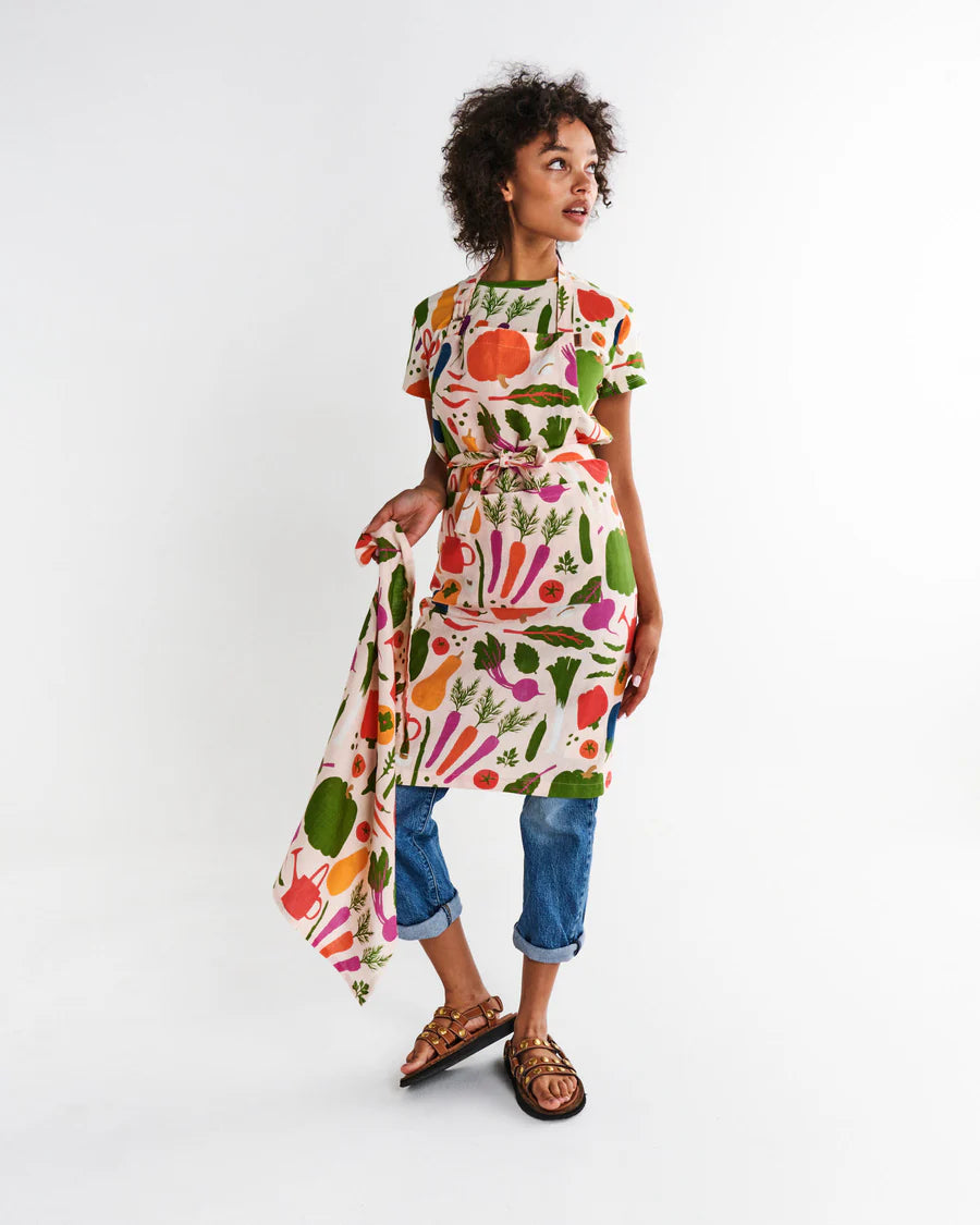 Kip and Co Stephanie Alexander harvest apron - model wearing in kitchen