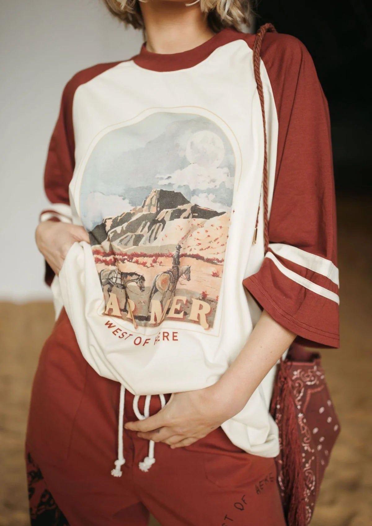 FAR MER - West Of Here Raglan Tee — front view flat lay